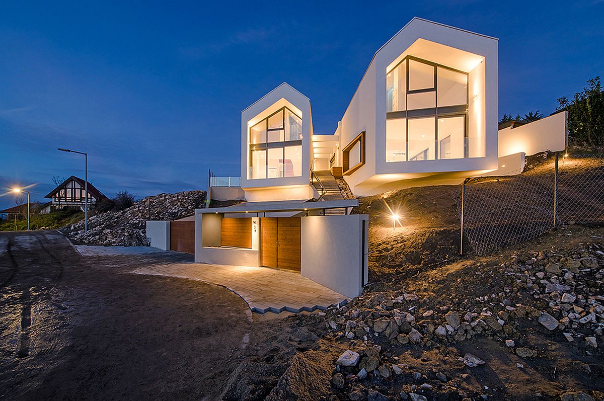 Twin gabled roofs of the V-House stand out visually