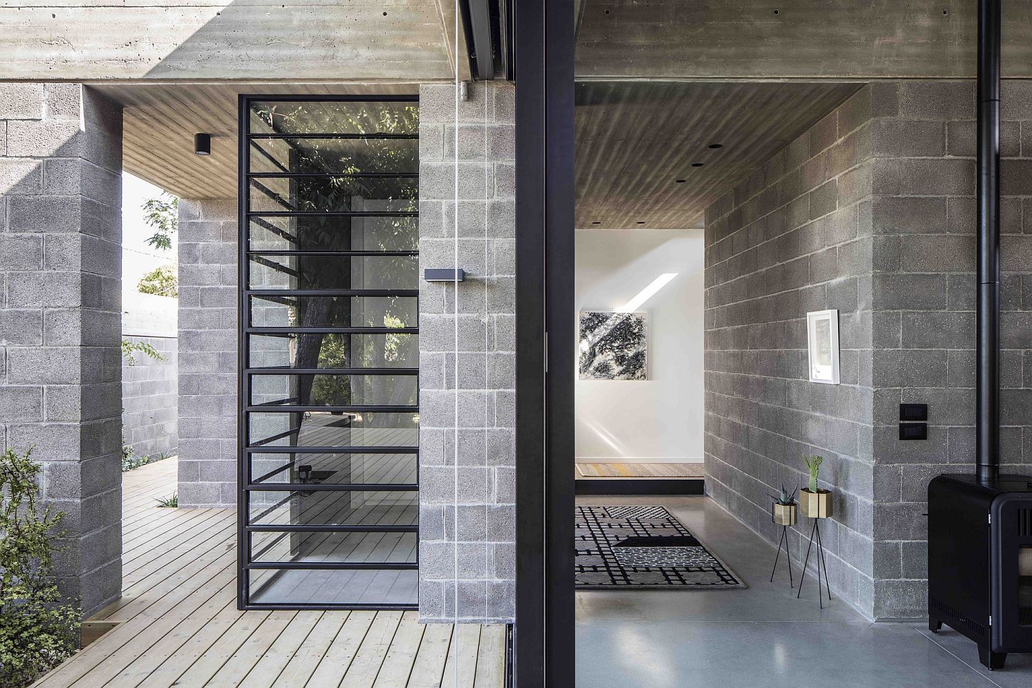 Wooden deck and walkways extend the living area outside