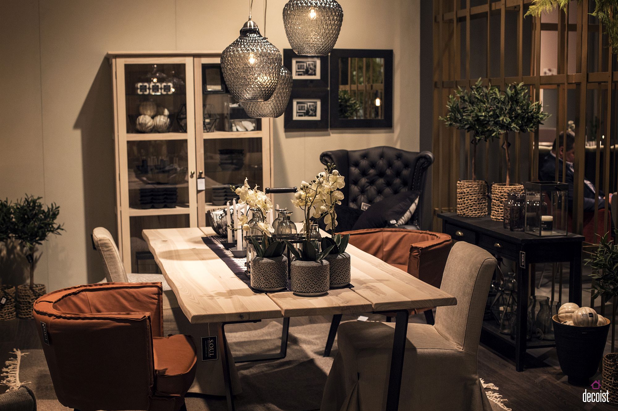 Wooden dining table with matching glass door cabinet for the modern farmhouse style dining