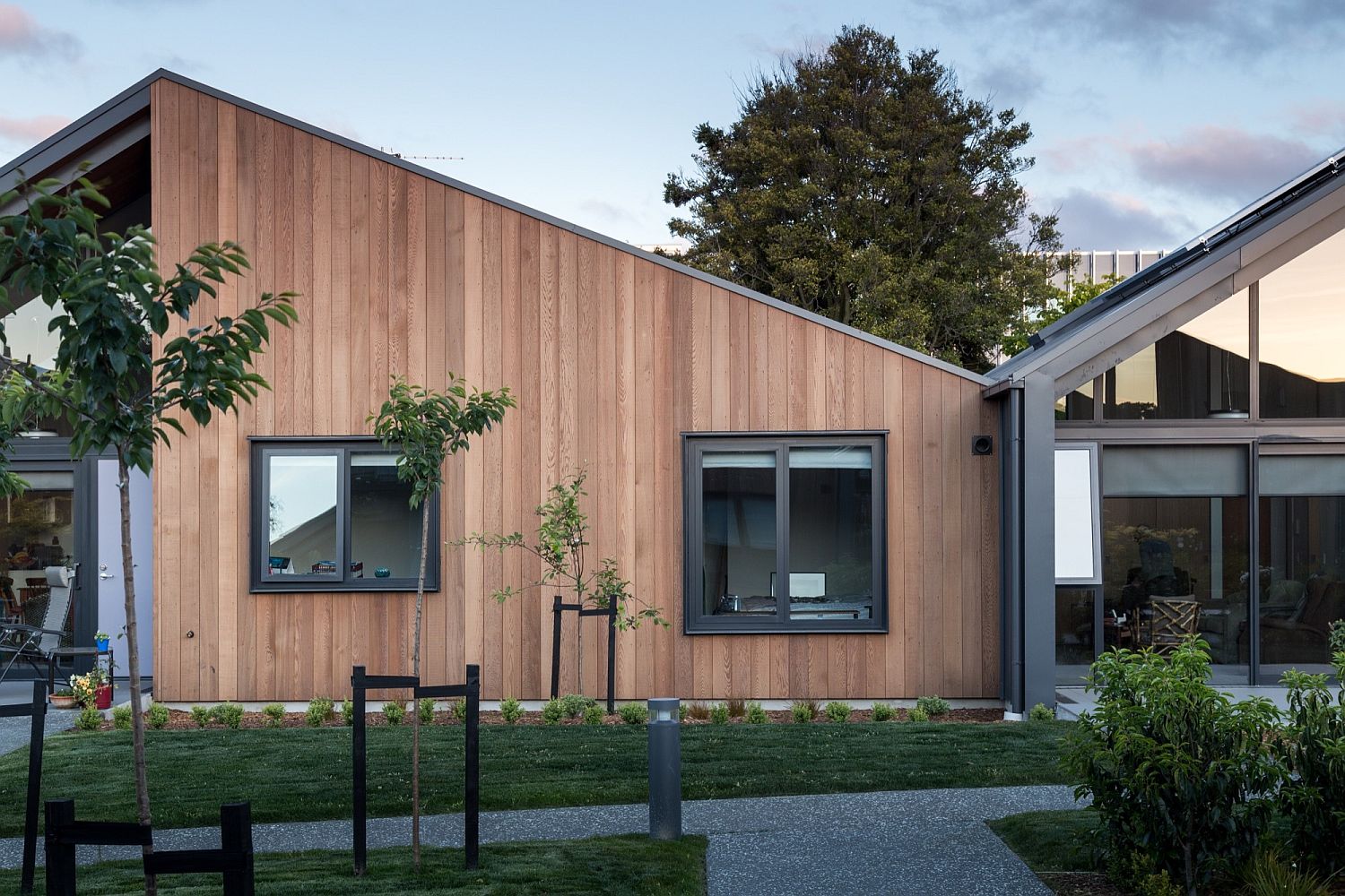 Wooden exterior and striking gabled frame of the Mary Potter Apartments