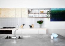 Wooden-shelf-above-the-kitchen-counter-is-a-space-savvy-addition-217x155