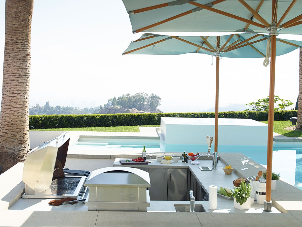 A modern white outdoor kitchen