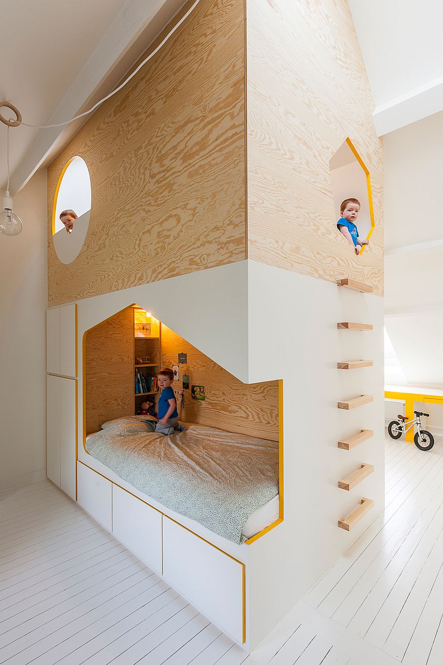 Bespoke kids&#039; bed design with twin beds and a loft playspace