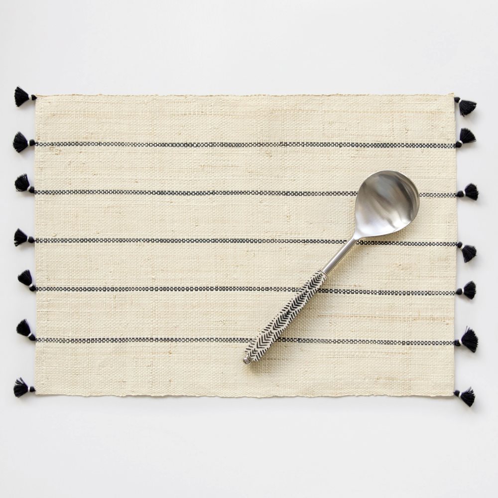 Black and white placemat with tassels