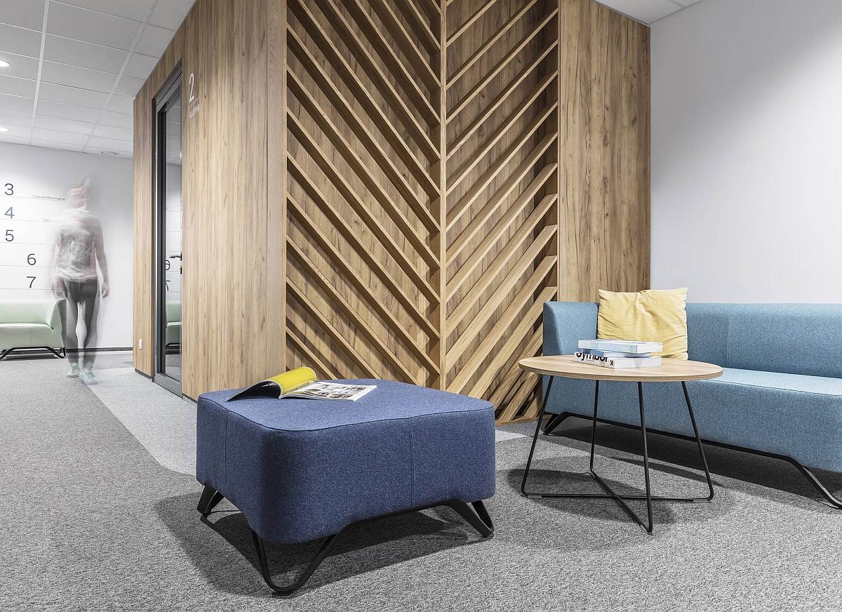 Chevron and herringbone patterns in wood add individuality to the office space