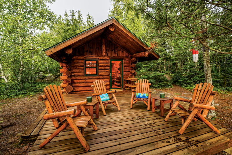 Classic log cabin with a big rustic deck