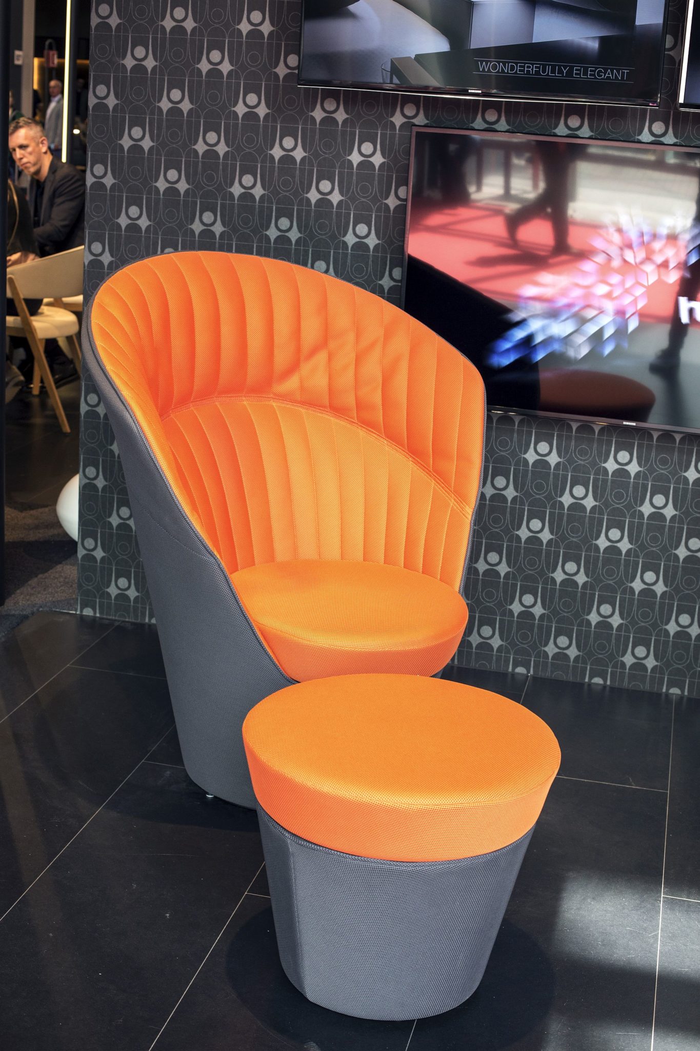 Comfortable high back chair from Huelsta in gray and orange