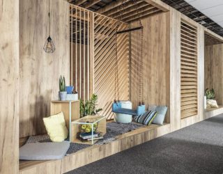 Embracing Wood: Smart Acoustics and Cozy Aesthetics Shape Office in Poznan