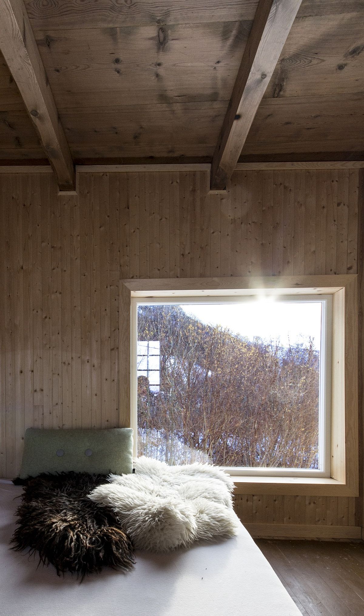 Comfy window seat with ample natural lighting