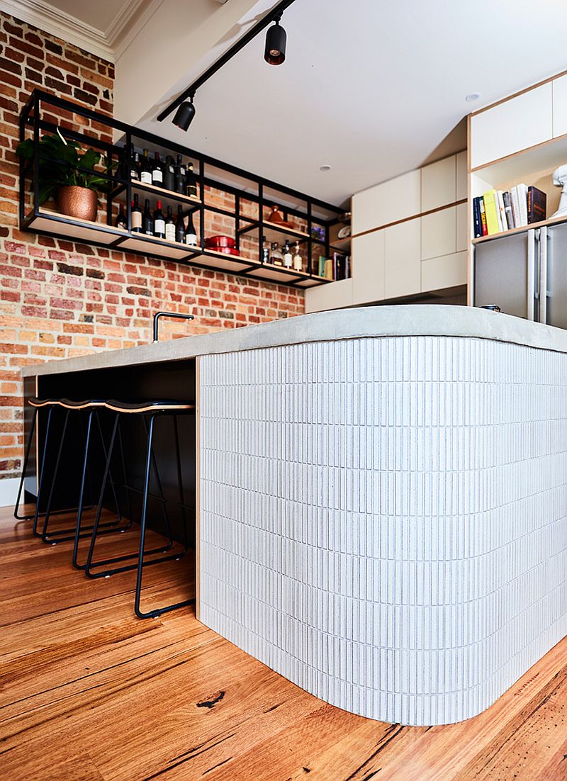 Curvy end to the kitchen island makes it a safer, kid-friendly option