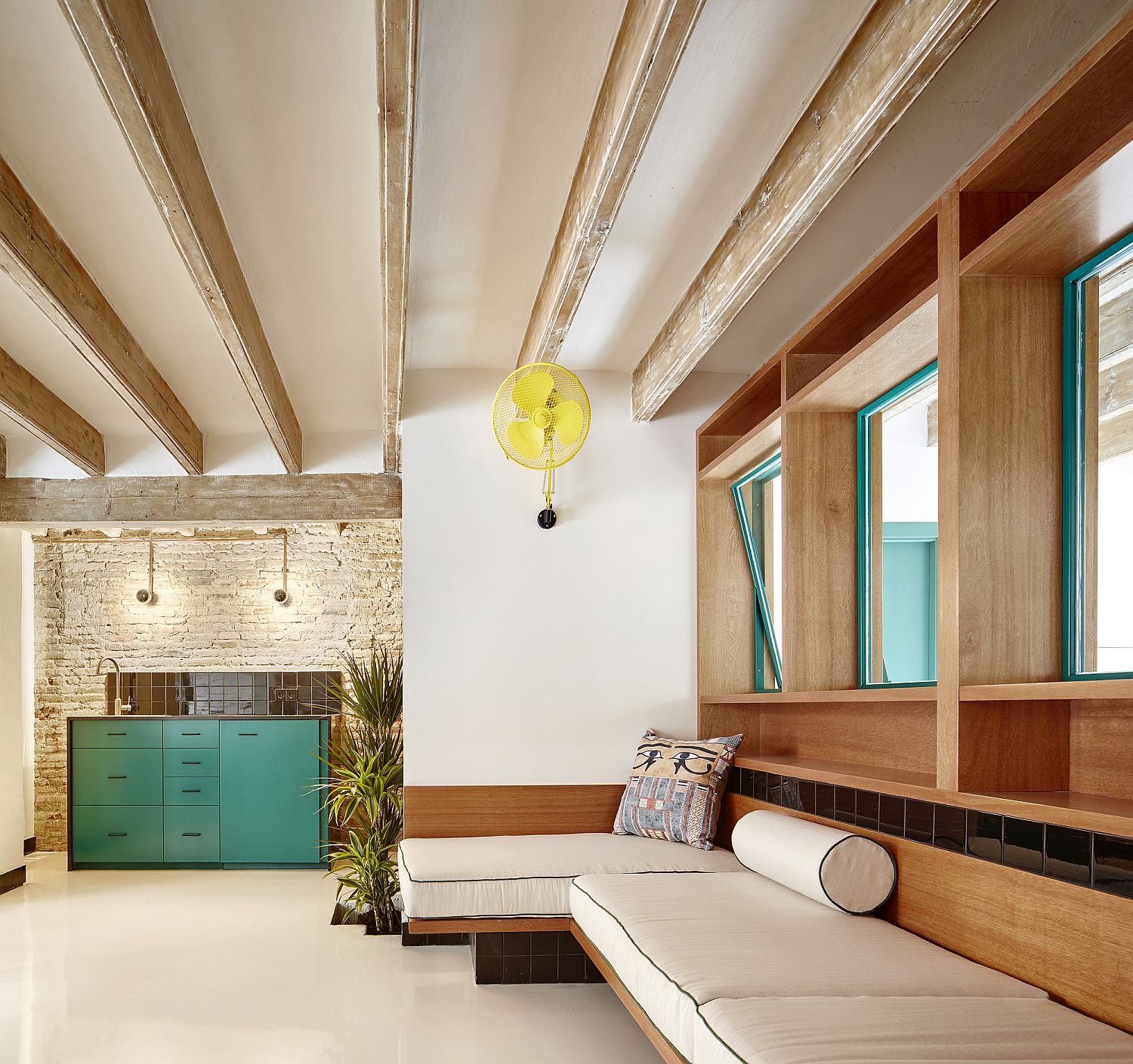 Custom low-slung decor for the Barcelona apartment