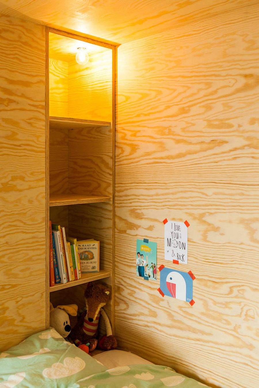 Custom-shelves-for-bedside-lighting-and-toys-in-the-kids-room