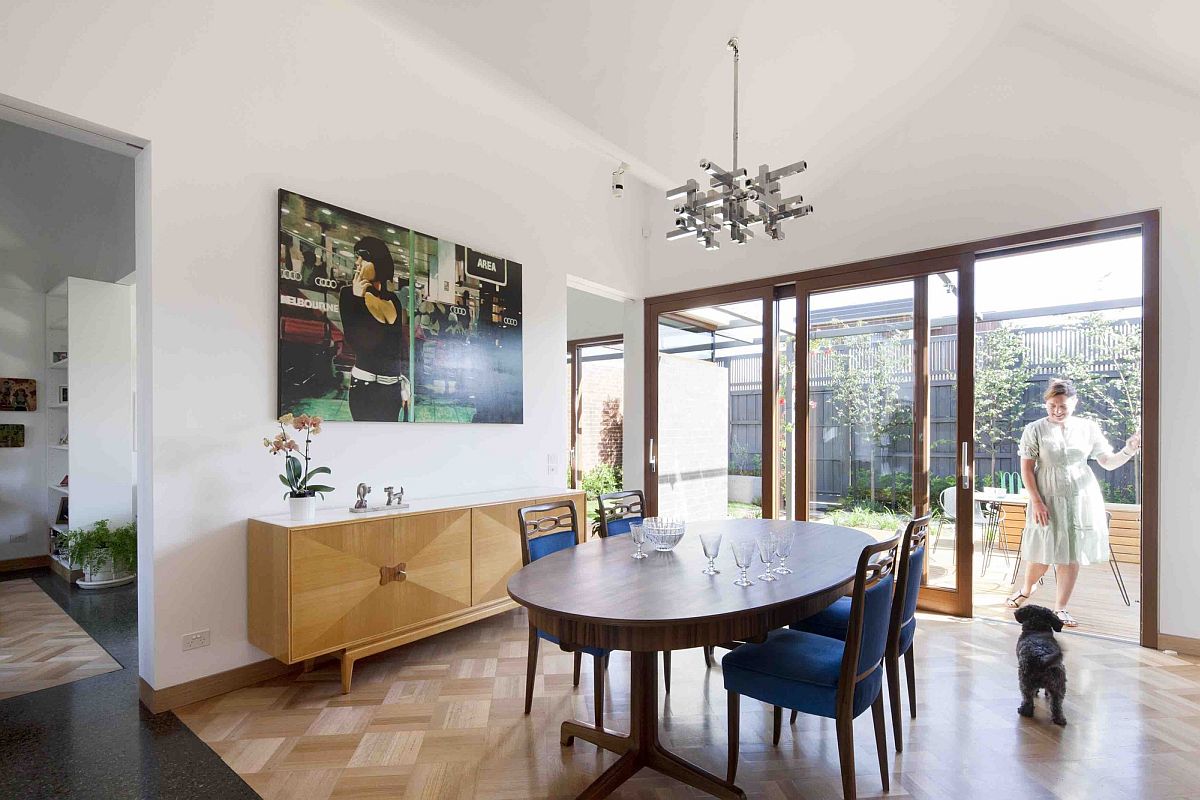 Dining area with wooden flooring to demarcate it from the living space and kitchen