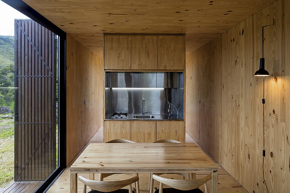 Dining room and kitchen clad in wood