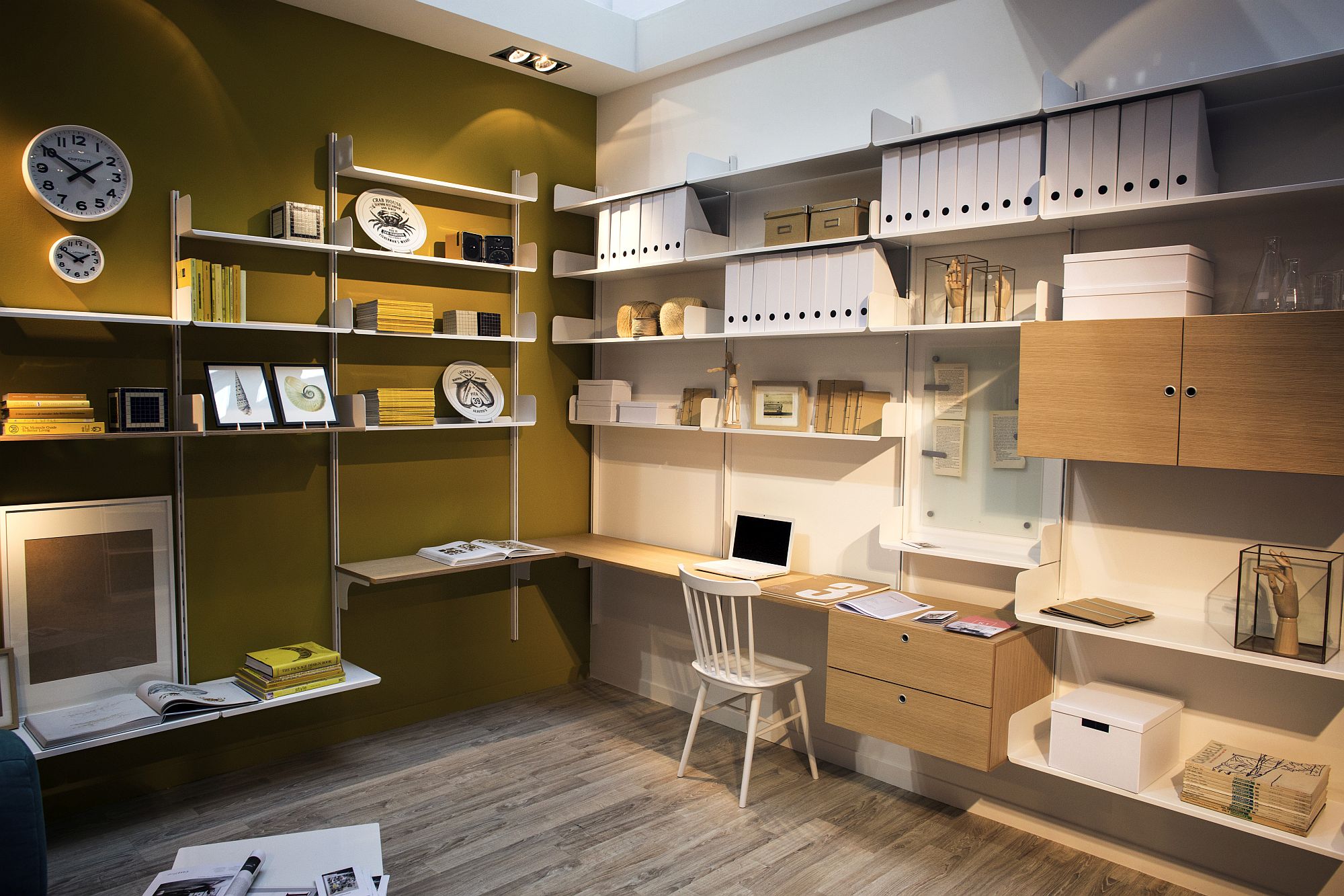 Extensive open shelving maximizes space in this small kids' bedroom