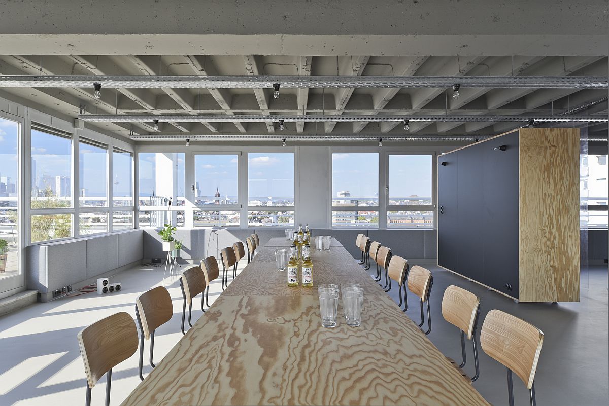 Gray and wood coupled with natural light for a fabulous conference room