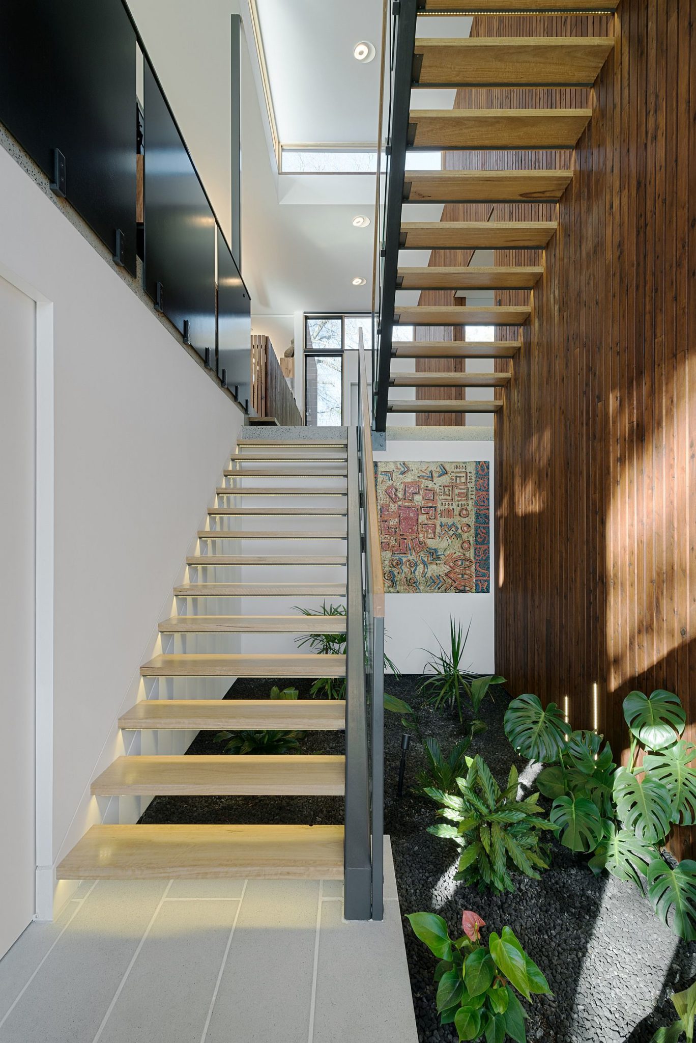 Indoor green nook under the staircase