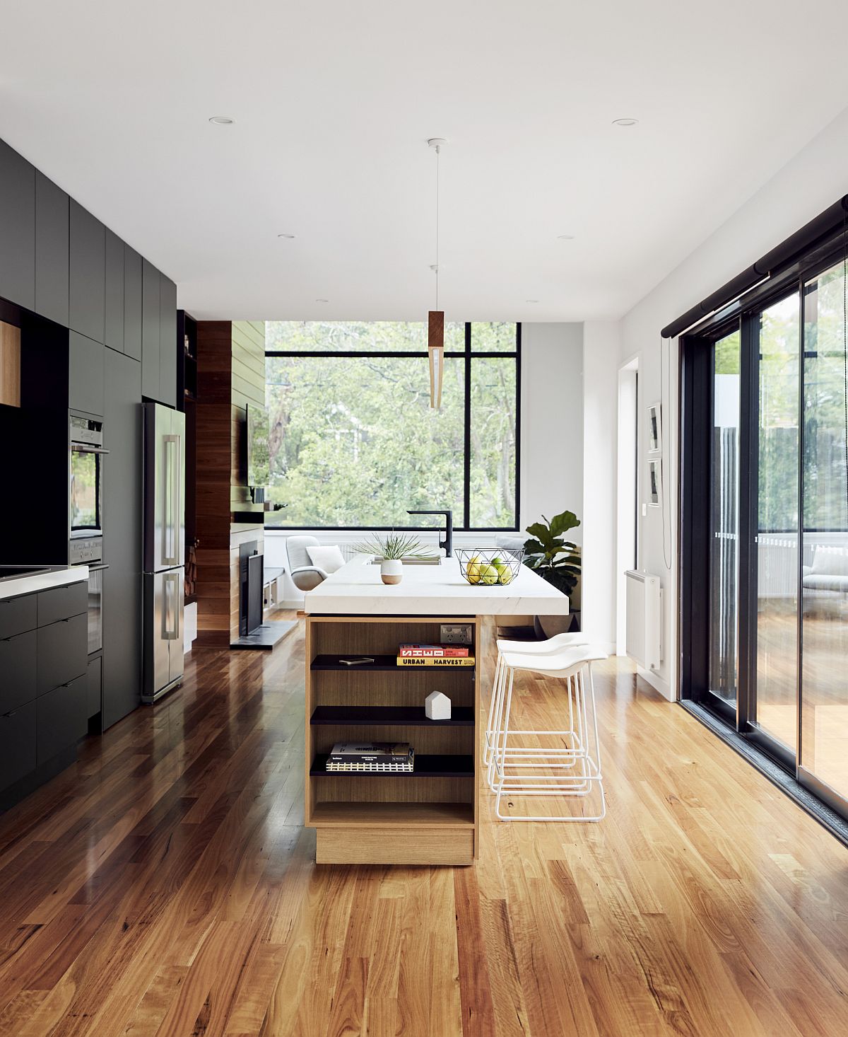 Kitchen island with open shelving for the modern interior