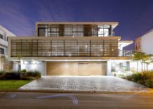 Lighting-adds-to-the-unique-timber-screen-clad-facade-of-the-home-217x155