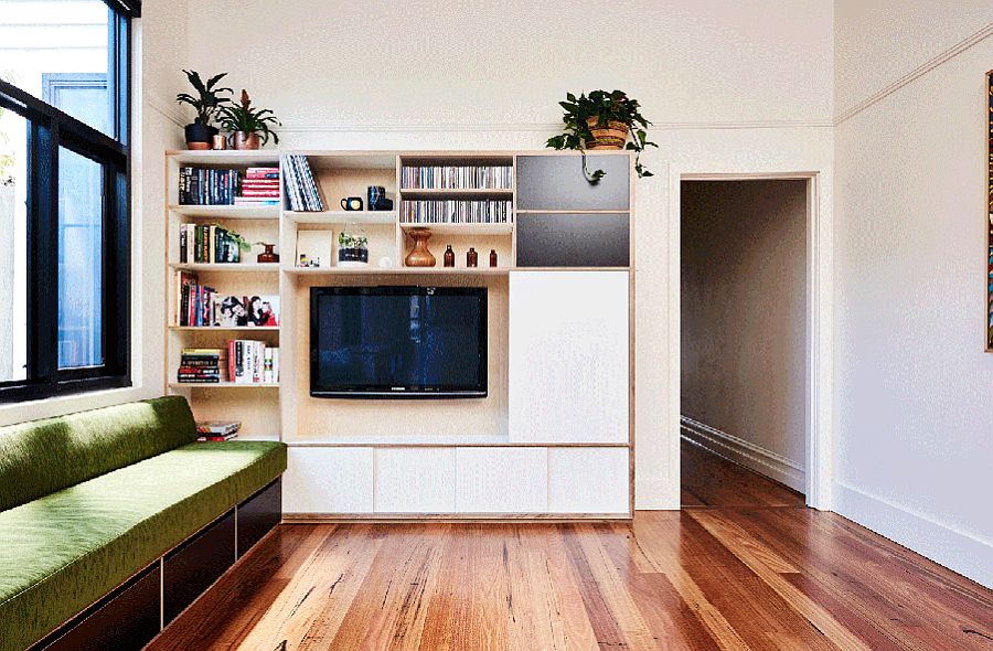 Movable doors cover the TV when not in use