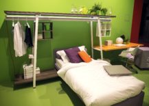 Open-hanger-system-above-the-bed-is-a-smart-space-saver-for-the-small-bedroom-217x155