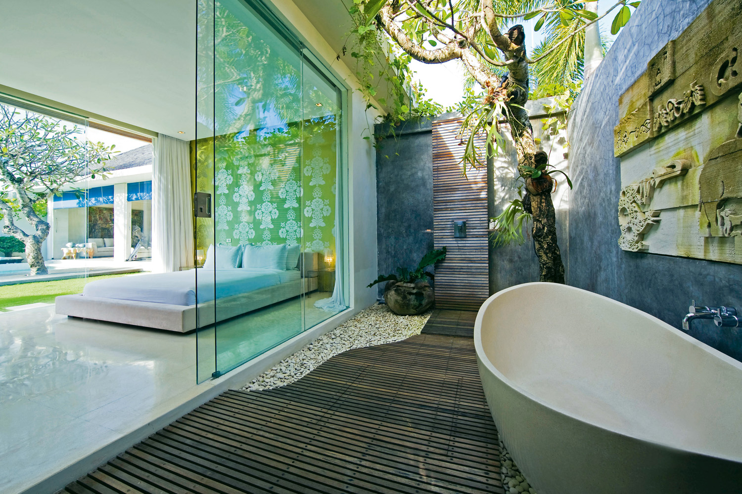 Organic-outdoor-shower-with-beautiful-wooden-flooring