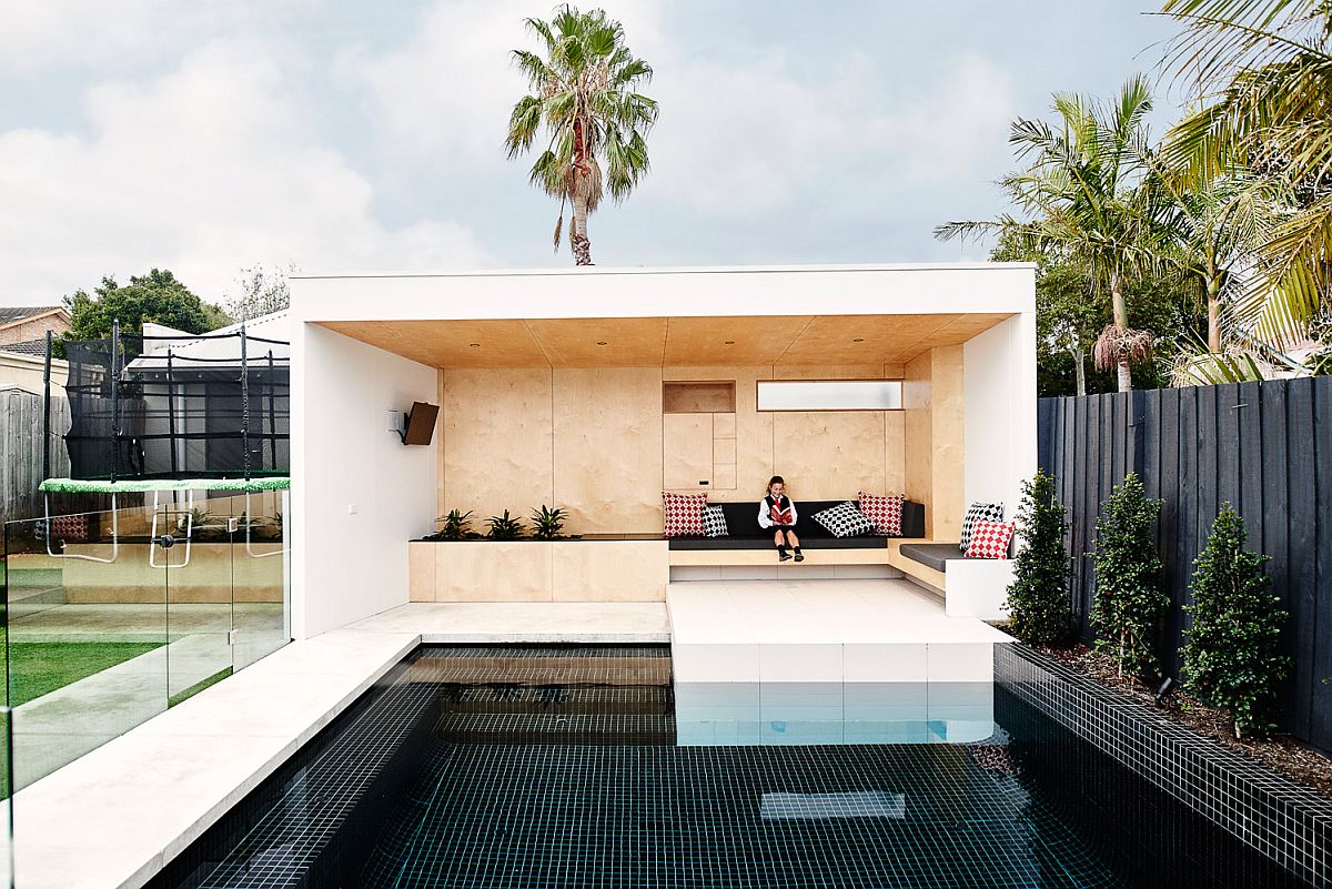 Plywood clad bunker at the end of the pool