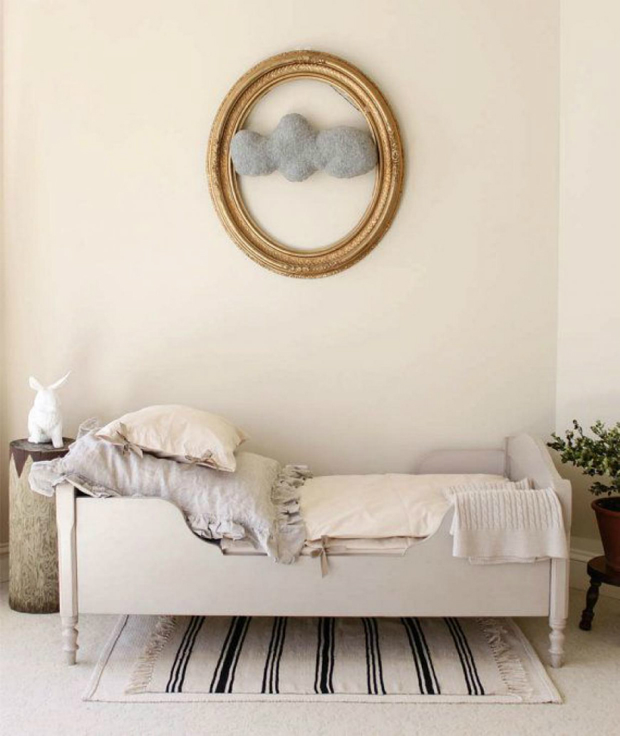 Simplistic kids bedroom with a beige and vintage bed