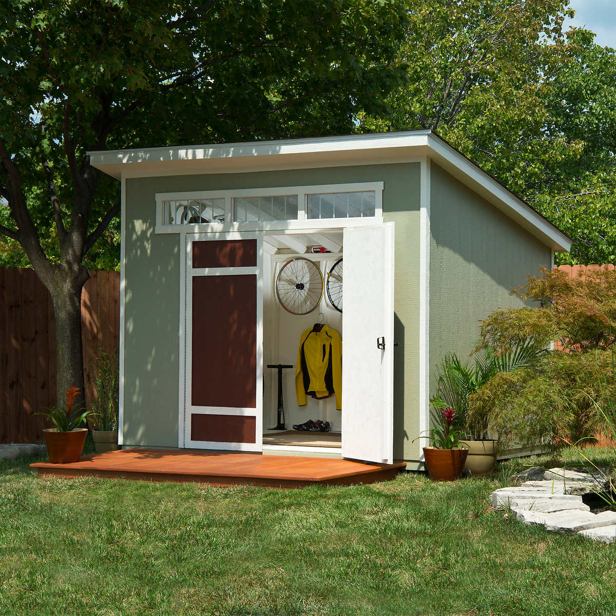 Small green & dark red backyard shed