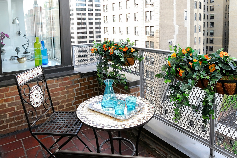 Small industrial balcony with temporary colorful pieces