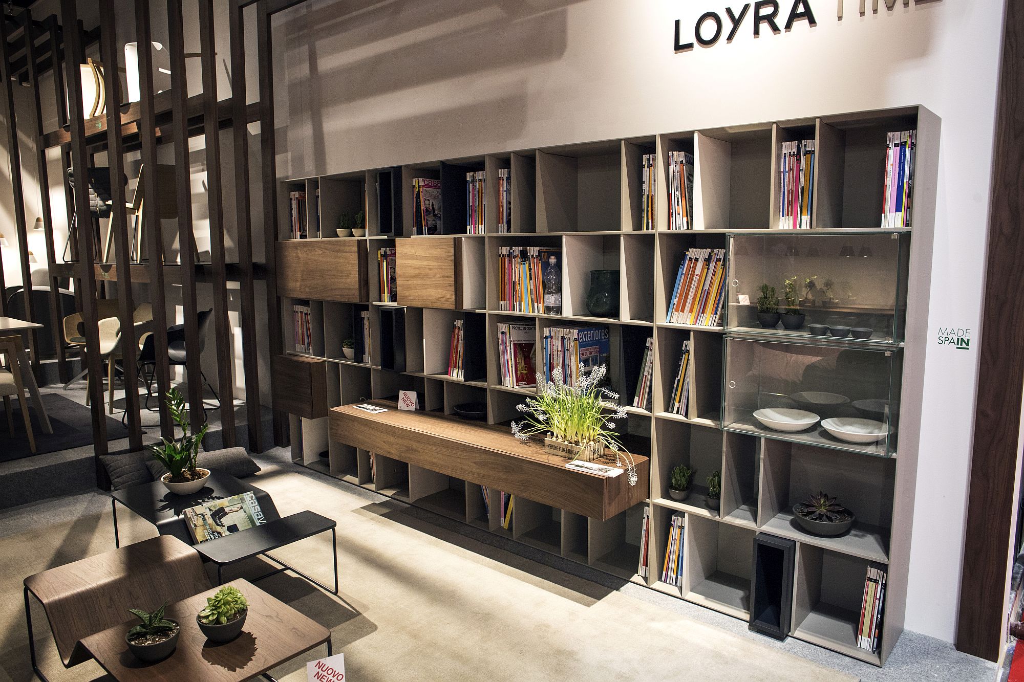 Spanish bookshelf design with floating wooden cabinets