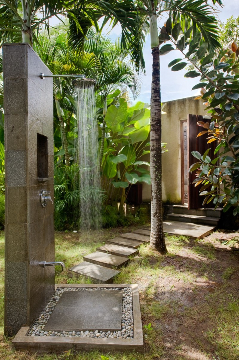 Stone shower as a small bit of luxury within your backyard