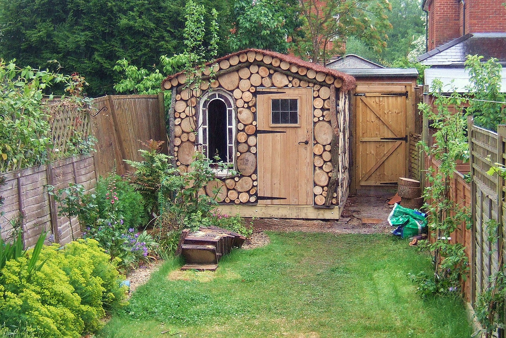 Tiny backyard shed made with natural materials