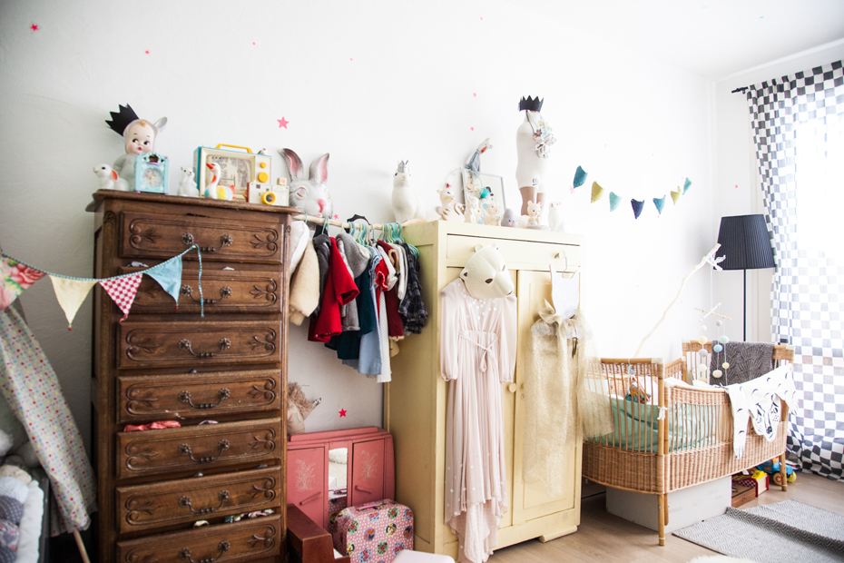 Vintage kids room with contrasting wooden cupboards