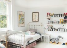 White-bedroom-with-an-eye-catching-vintage-iron-bed-217x155