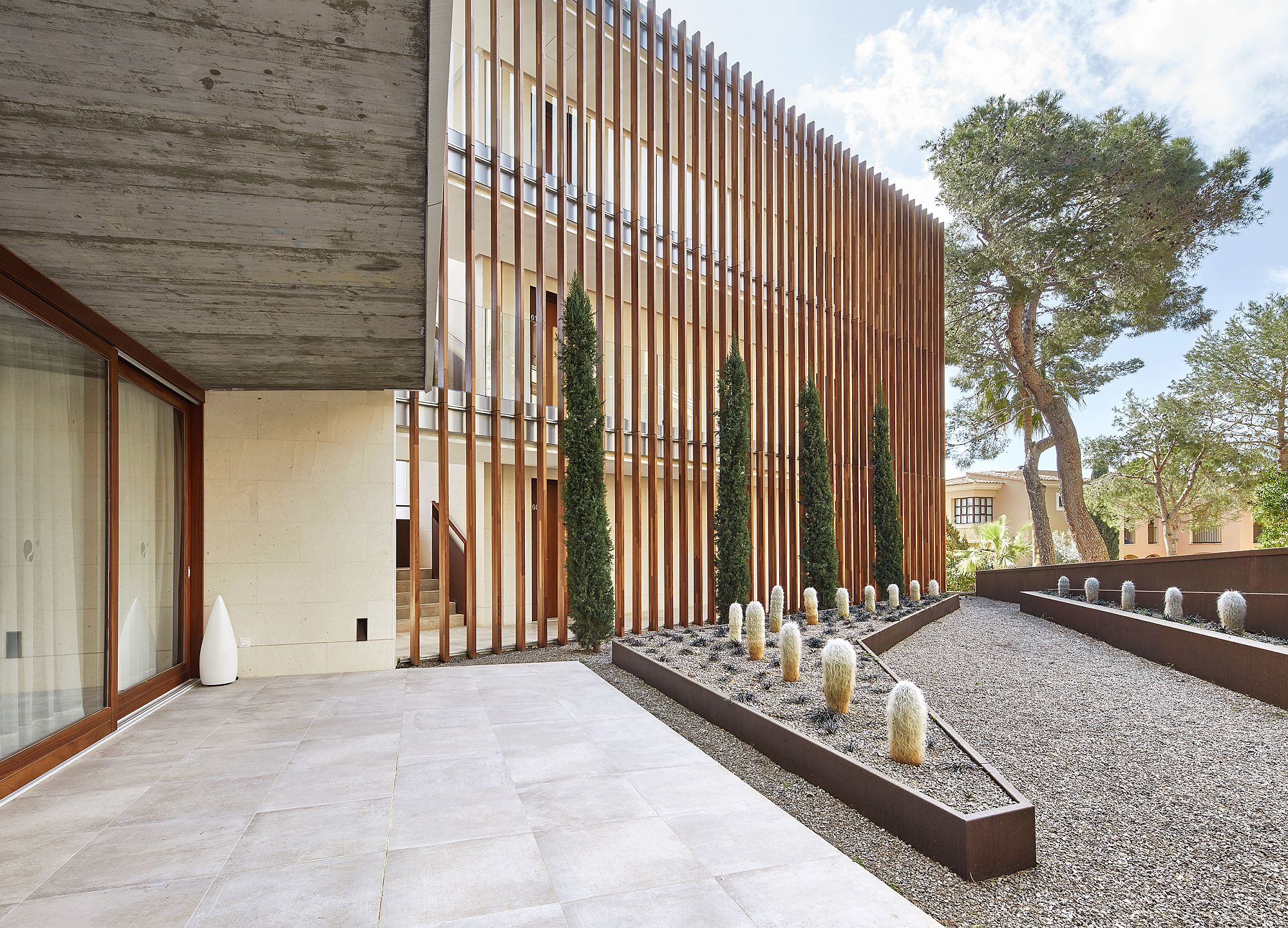 Wooden slats give the facade of the building a unique look