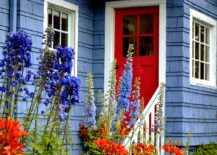 A-house-with-lovely-blue-exterior-and-eye-catching-red-door--217x155