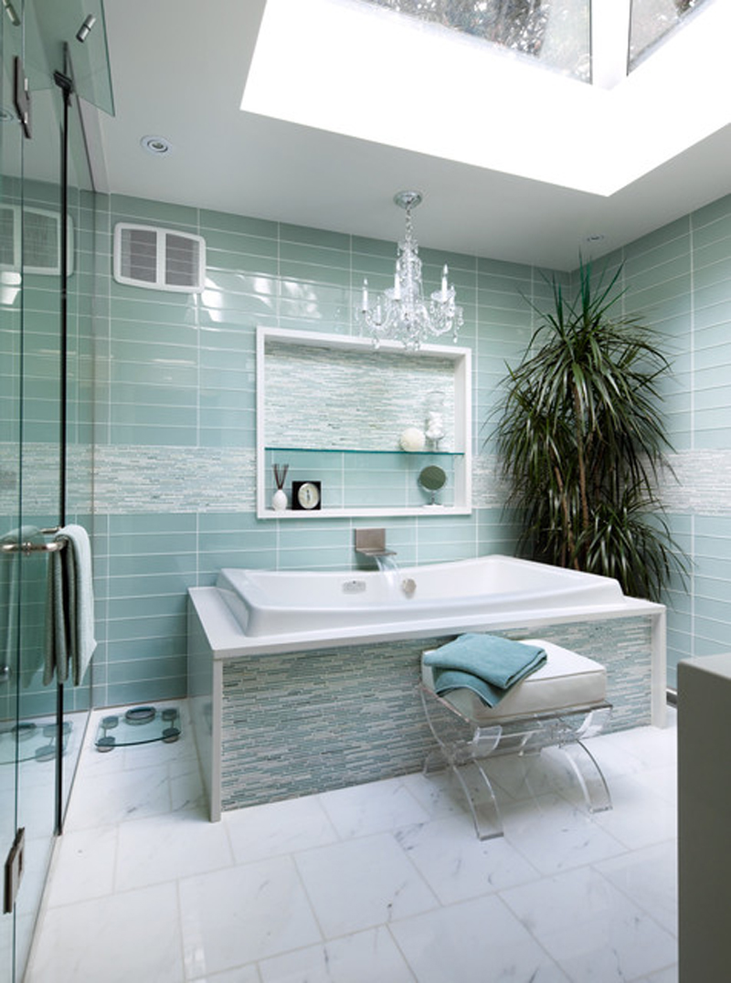 A light turquoise bathroom with a sophisticated look