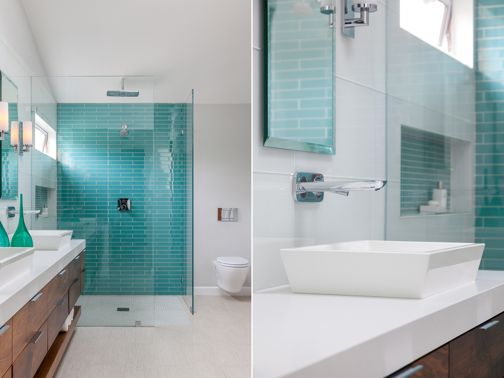 Bathroom with turquoise shower tiles that impact the whole space