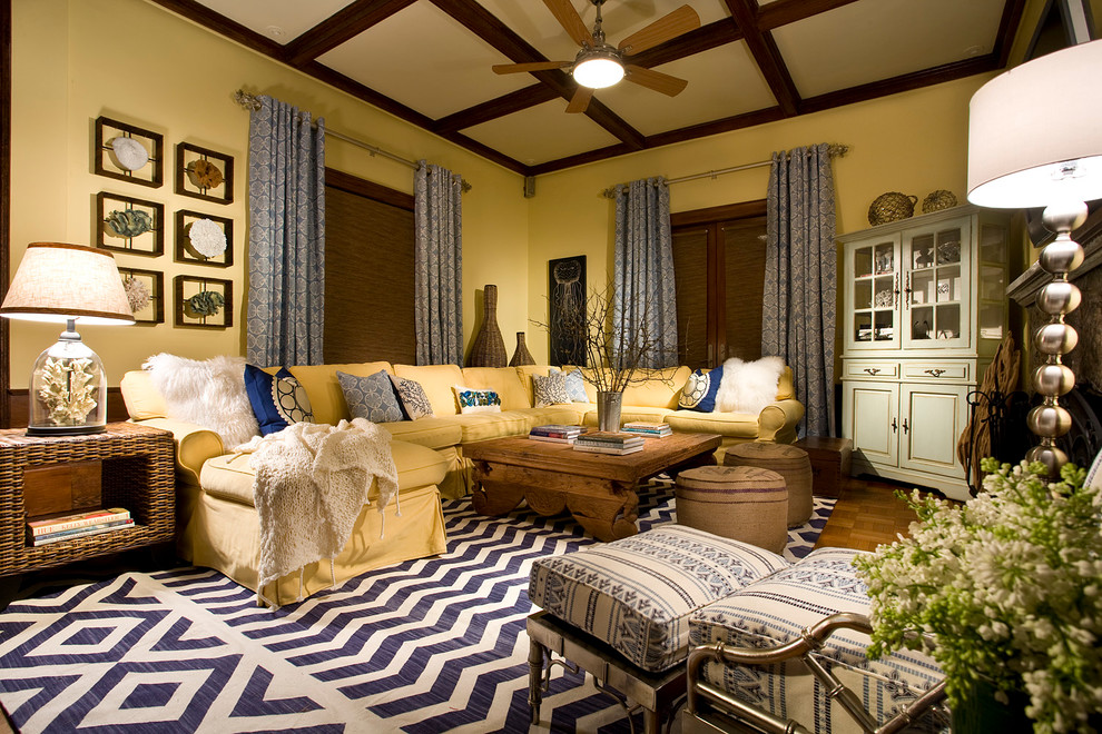 Big yellow sofa in a warm and cozy rustic living room