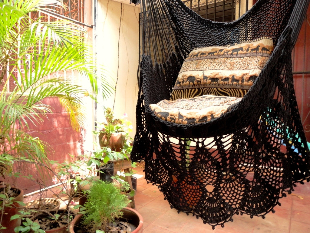 Black hammock chair with a crochet fringe