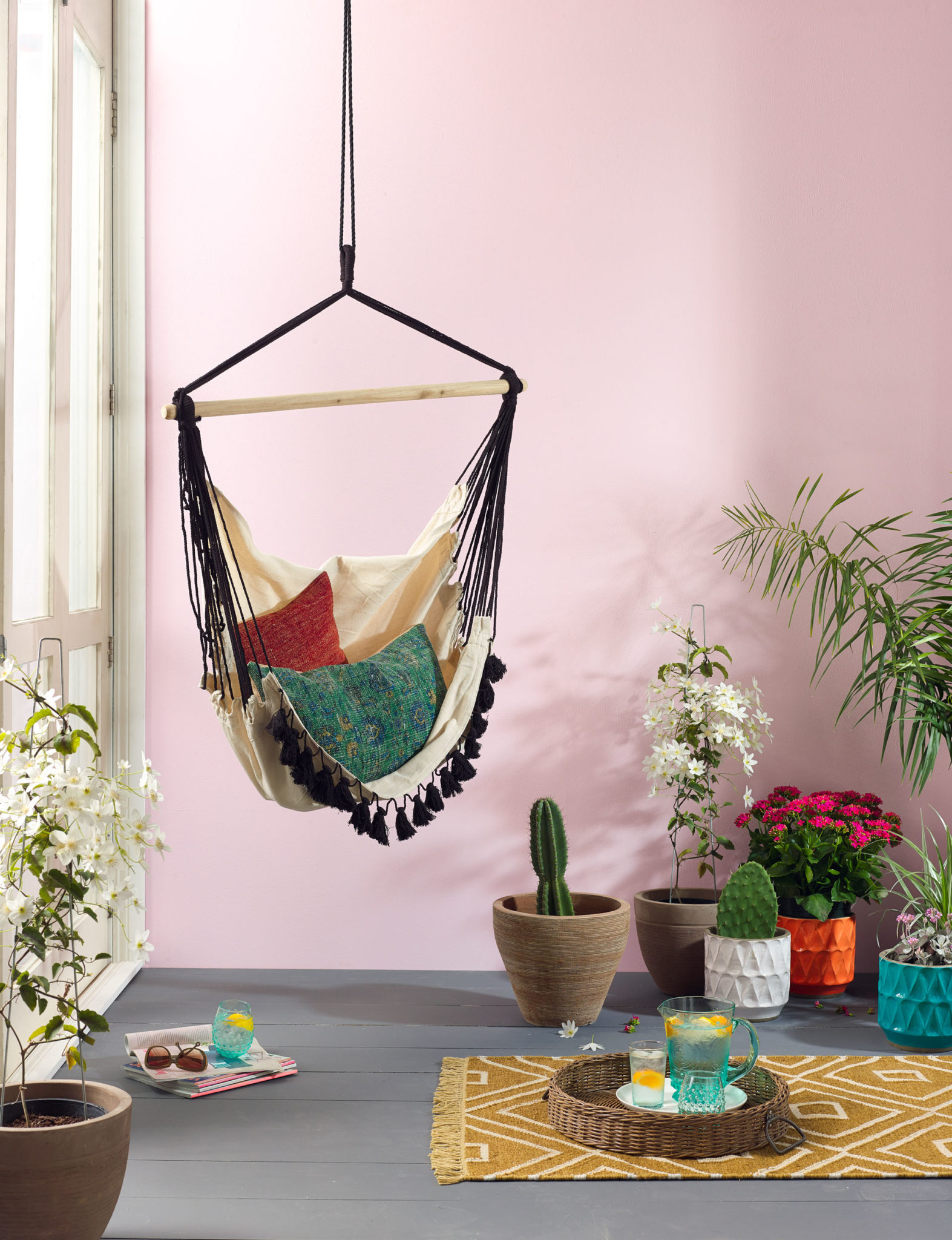 Bohemian hammock chair in a pastel room