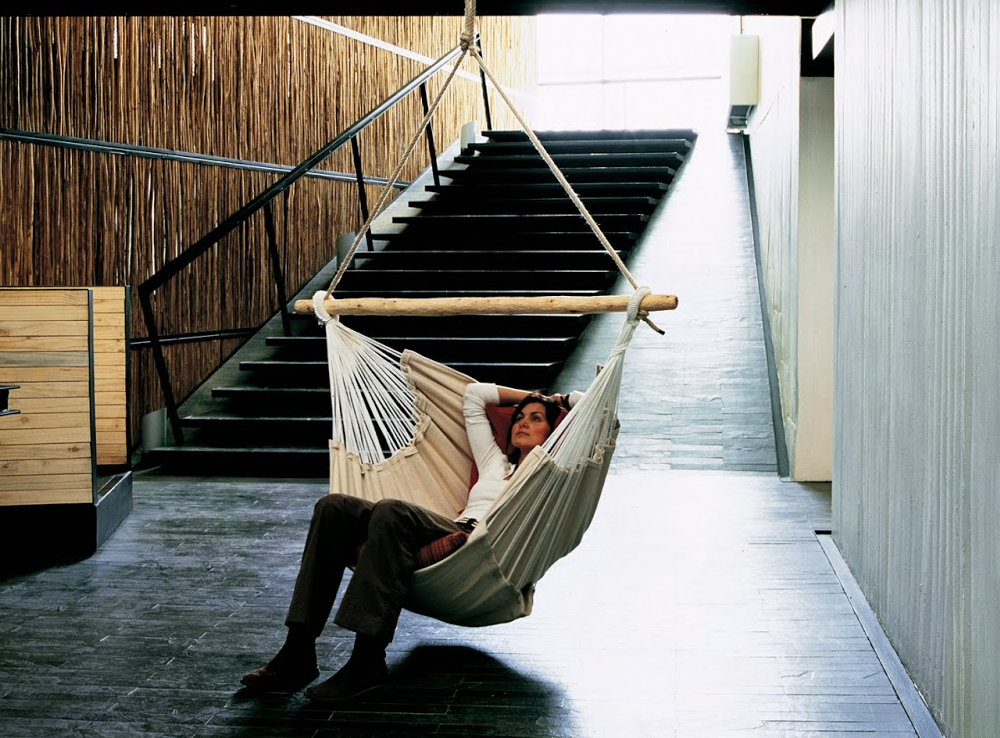 Bohemian hammock chair in an airy room