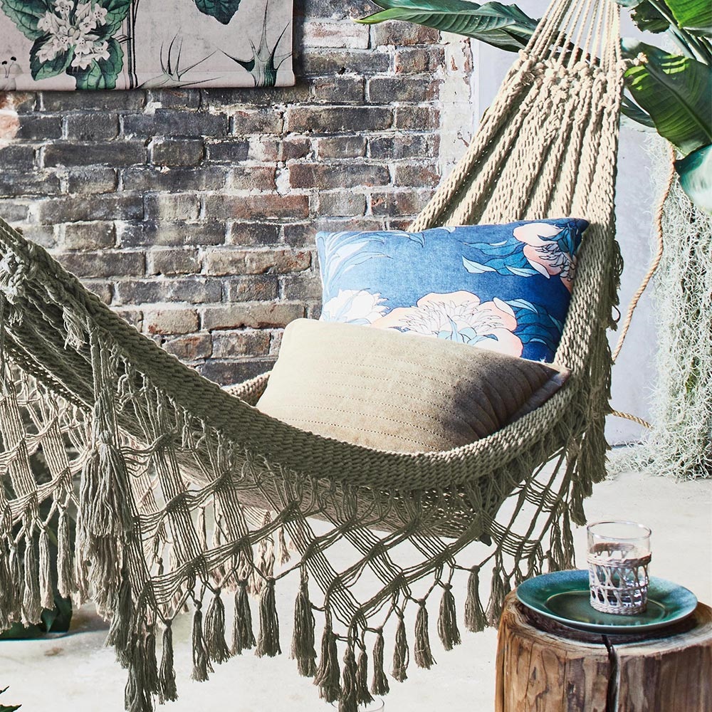 Bohemian-hammock-in-a-neutral-color-with-a-fun-fringe-