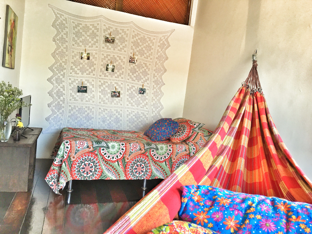 Bohemian hammock in bright and cheerful shades of red