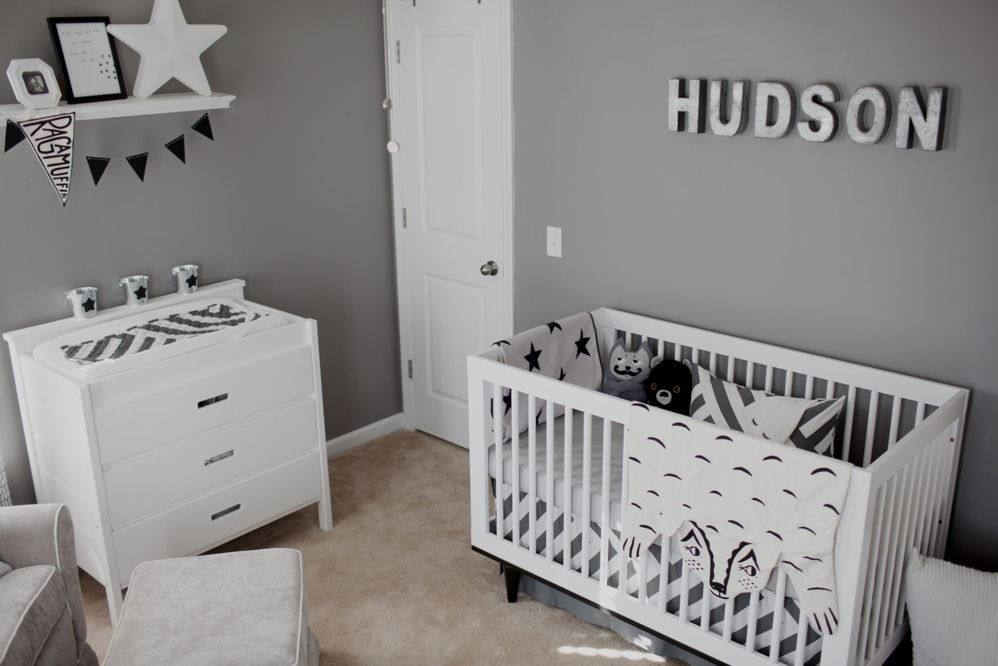 Coherent monochrome nursery with gray walls