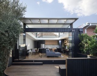 Roof that Curves Upwards Brings Light into This Revitalized Aussie Home