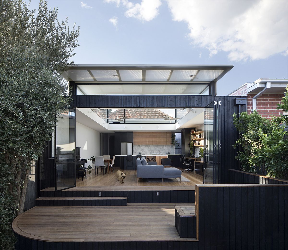 Contemporary-rear-extension-of-brick-house-in-Melbourne-with-curved-roof