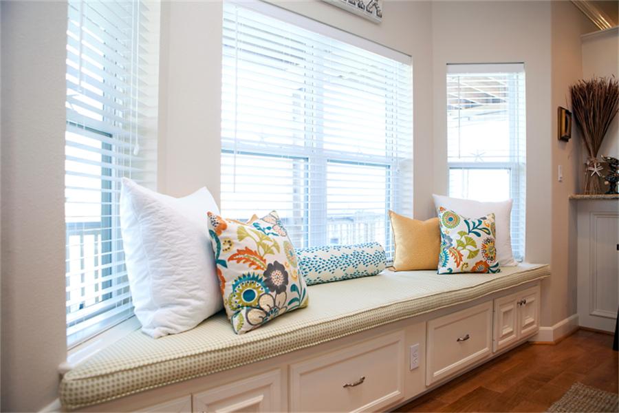 Cushions with creative patterns and colors bring dynamic to the window seat