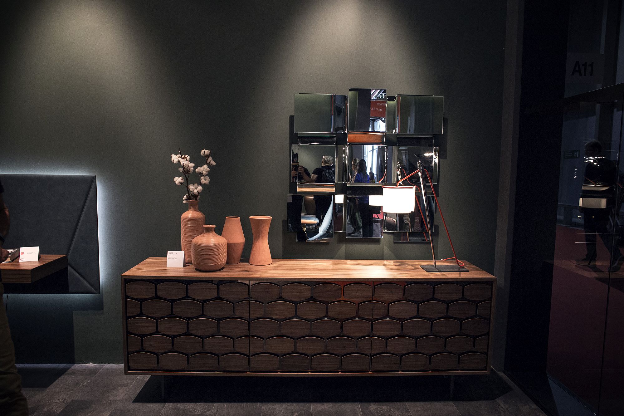 Dashing mirrors above the sideboard bring elegance to the modern entryway